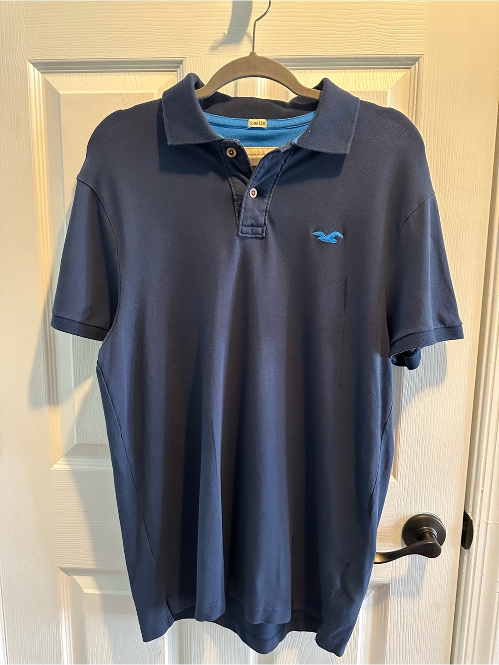 Hollister Men's Stretch Navy Polo with Light Blue Logo Size L